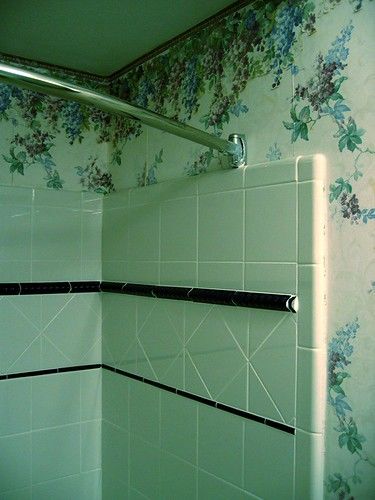 Green mold on bathroom shower tile