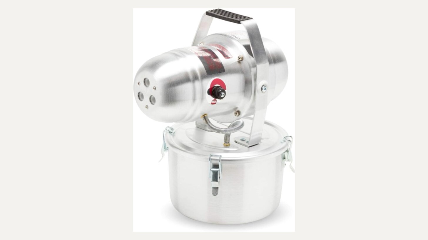 Cold ULV fogger machine used to apply mold control solution across a room